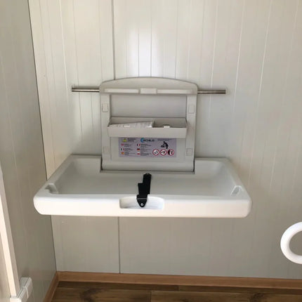 Contenedor sanitario con revestimiento exterior efecto madera.