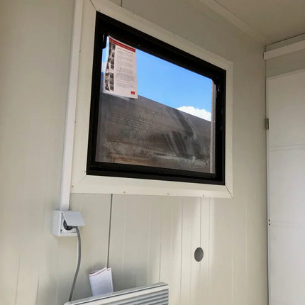 Contenedor sanitario con revestimiento exterior efecto madera.