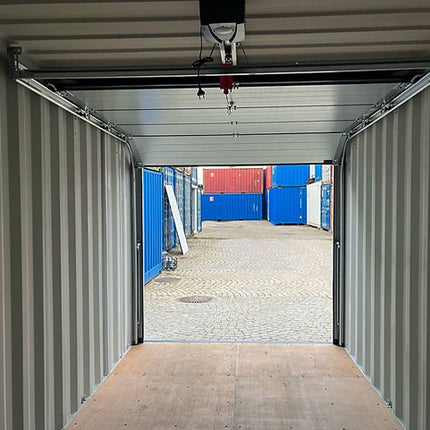 Contenedor marítimo de 20 pies con puerta seccional