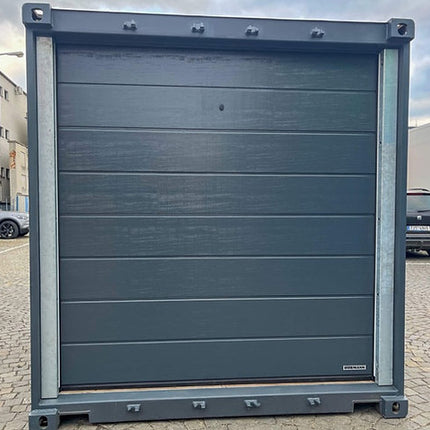 Contenedor marítimo de 20 pies con puerta seccional